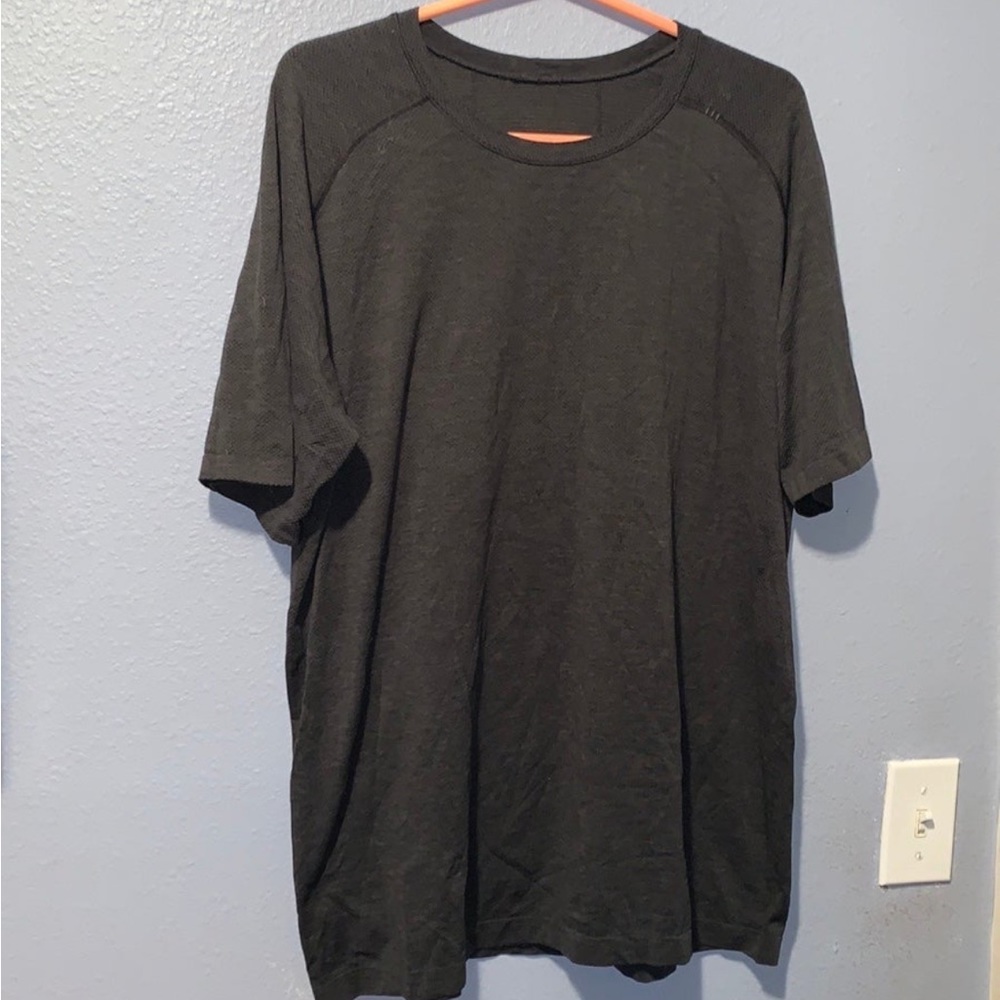 Black lululemon metal tech shirt.